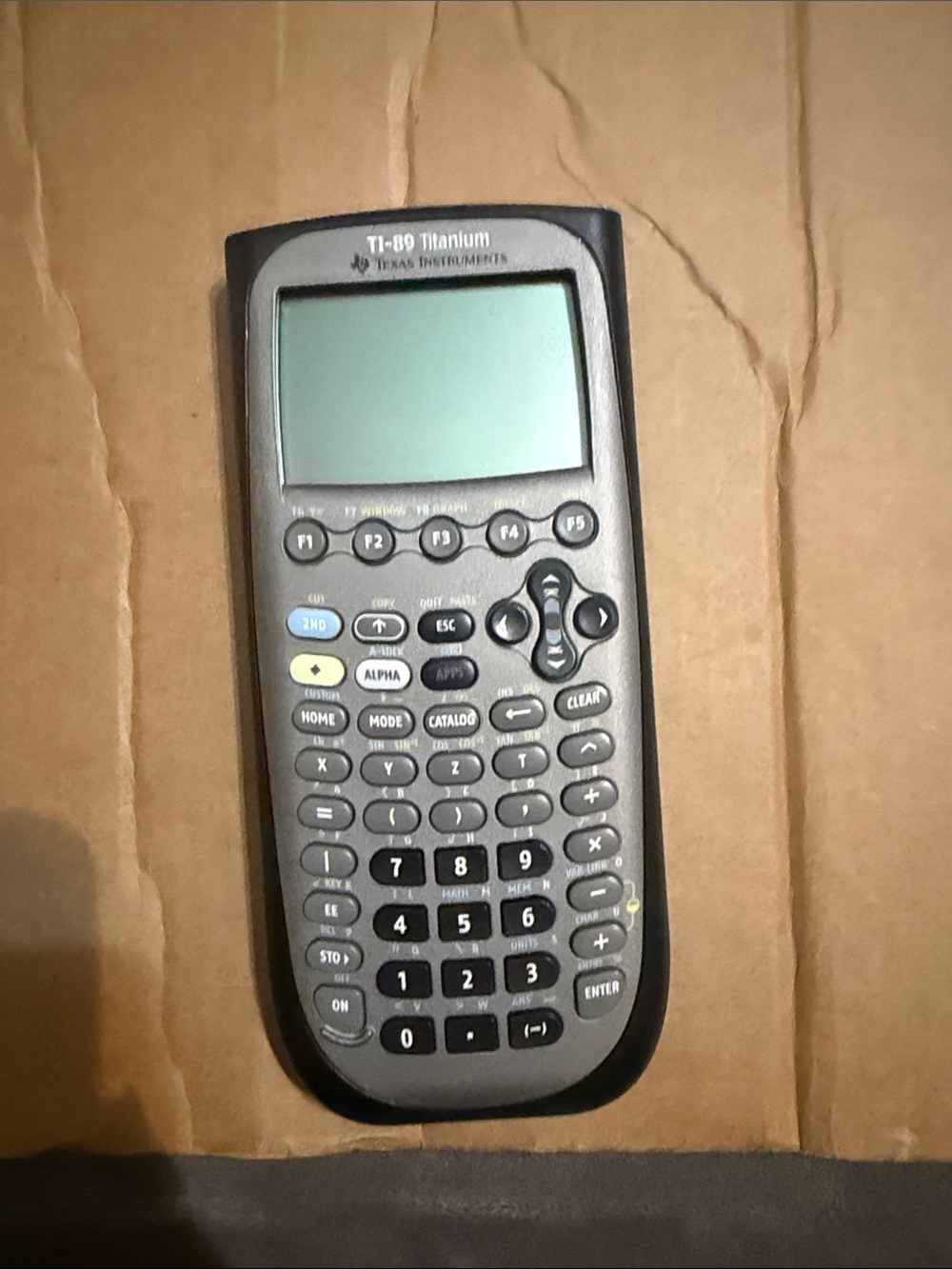 Texas Instruments TI-89 Titanium Graphing Calculator in Gray and Black
